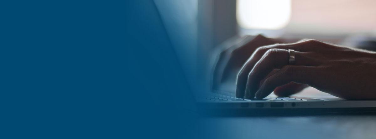 person typing on the computer