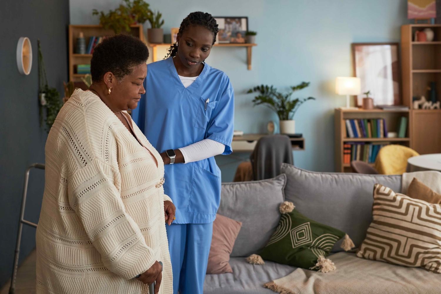 Nurse Helping a MI Choice Medicaid Waiver Client at home